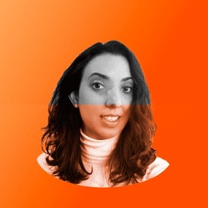 Um fundo laranja com o rosto de uma mulher.
